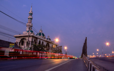 The mosque in the morning and evening car lights , lights trails long exposure