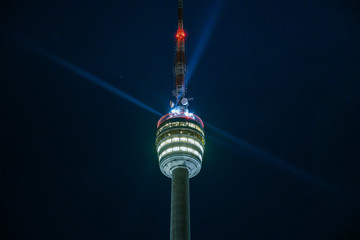 Stuttgart Television Tower (Fernsehturm) against night sky with stars and light beams, Germany © Timo Günthner