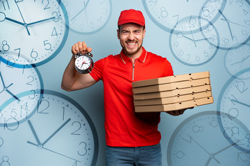 Deliveryman is punctual to deliver quickly pizzas. Cyan background