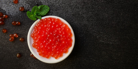 red caviar (seafood, salmon caviar) menu concept. food background. top view. copy space