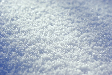  macro photo of snow texture with sunlight