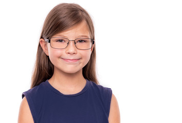 Obraz premium Portrait of a little girl with glasses isolated on a white backgroud.