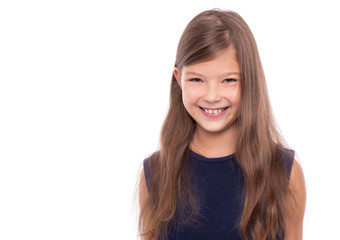 Portrait of a smiling young girl on a white background.