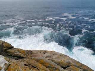 waves crashing on rocks