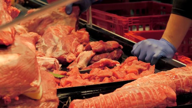 Cutting and processing of meat at a meat-packing plant. Food industry