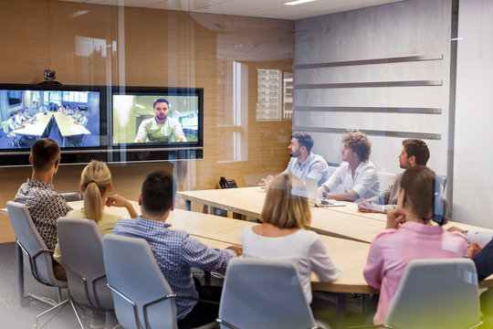 Business people in video conference meeting