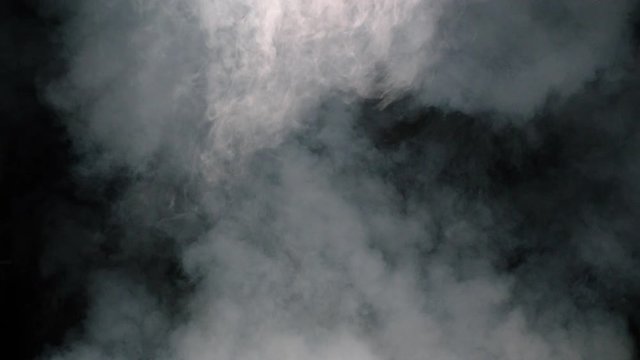 White and grey smoke in front of black background for overlay