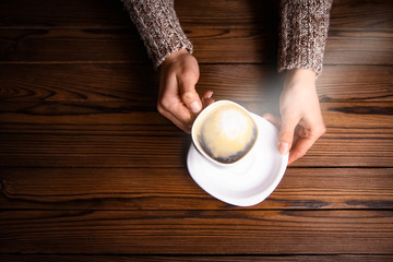 female hands and coffee
