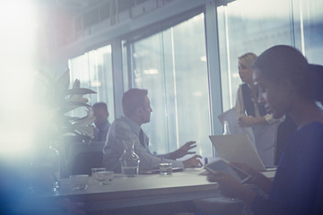 Silhouette business people talking in conference room meeting