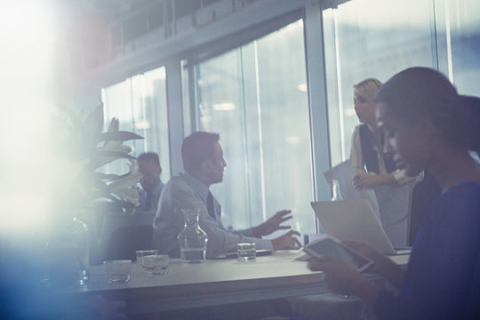 Silhouette business people talking in conference room meeting