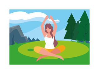 woman outdoors practicing yoga with background landscape