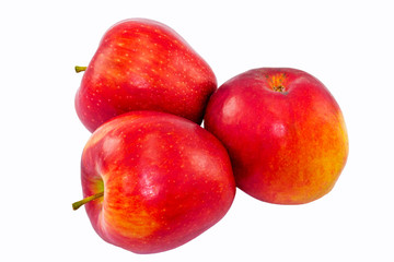 three red apples on a white background