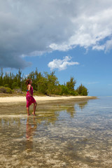 Girl on the beach of Ile aux Benitiers, Mauritius