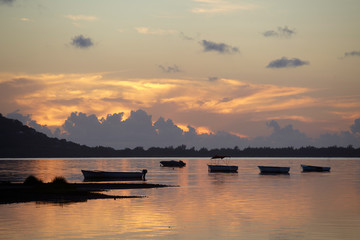 Fototapeta premium Little harbour at sunset in Le Morne Brabant, Mauritius
