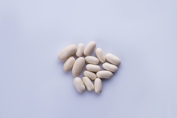 Top view heap of white beans. Isolated on white background.