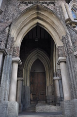 Fototapeta na wymiar Gothic style doorway at university
