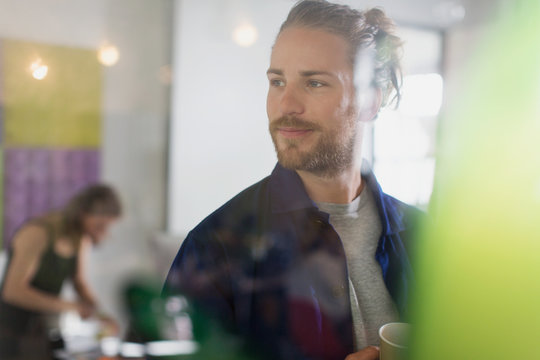 Confident businessman in office