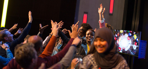 Audience cheering for female speakers