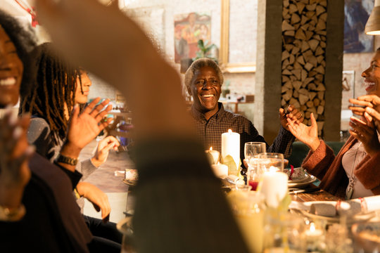 Happy multi-generation family enjoying Christmas dinner