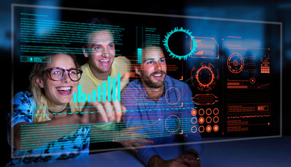 Enthusiastic business people using futuristic hologram computer