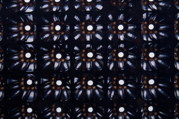 Patterned black cells with lighting texture. Close-up.