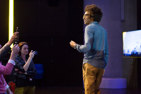 Male speaker talking on stage