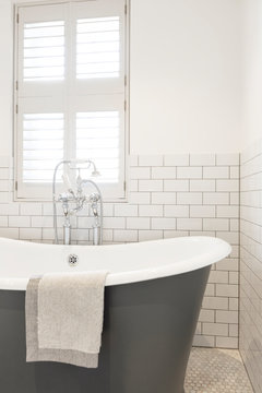 Luxury home showcase soaking tub in white bathroom