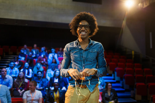 Portrait smiling, confident male speaker
