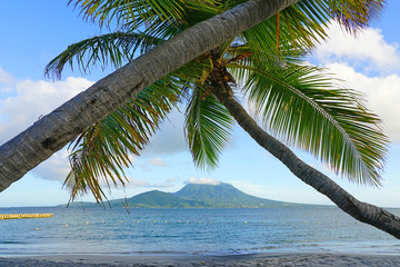 Day view of the Nevis Peak volcano across the water from St Kitts