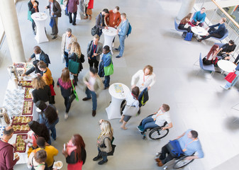 Business people networking, enjoying coffee break at conference