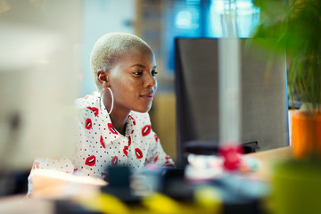Focused businesswoman working at computer in office