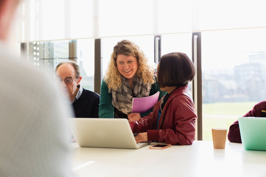 Business people talking in conference room meeting