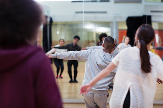 Dancers dancing in dance class studio