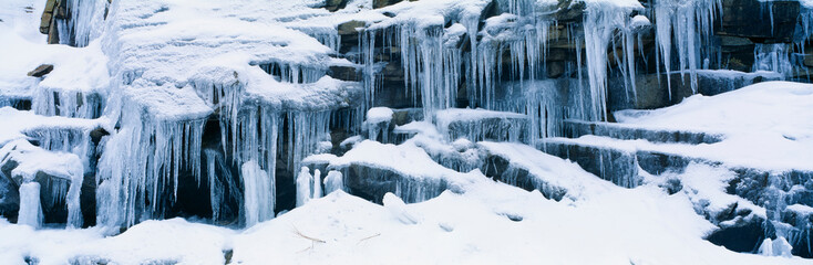 Icicles and snowy rocks in Sierra Nevada Mountains, California