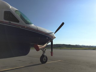Cargo propeller plane parked in airport yard