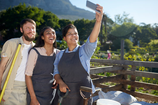 Farm workers taking selfie