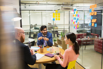 Creative business people brainstorming in conference room meeting
