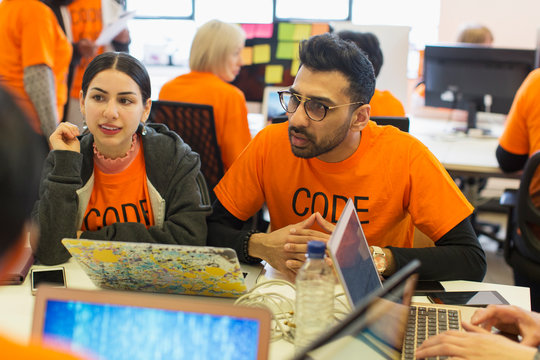Hackers coding for charity at hackathon