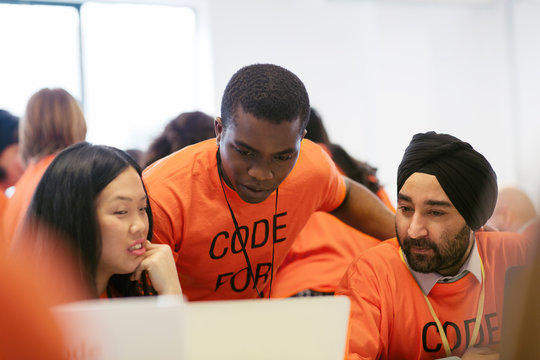 Hackers coding for charity at hackathon