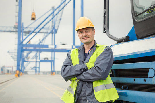 Portrait confident dock worker at shipyard