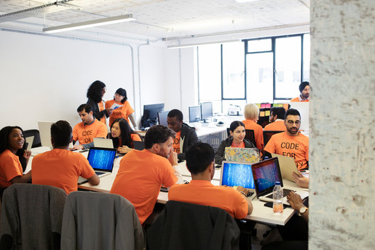 Hackers coding for charity at hackathon
