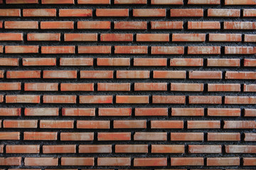 Red brown brick wall texture background.