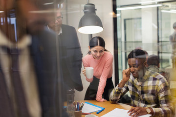 Creative business people brainstorming in conference room meeting