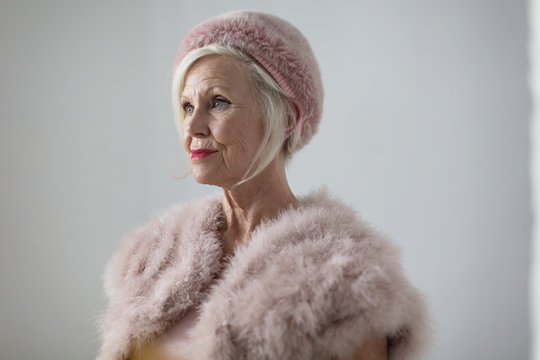 Portrait elegant senior woman wearing fur