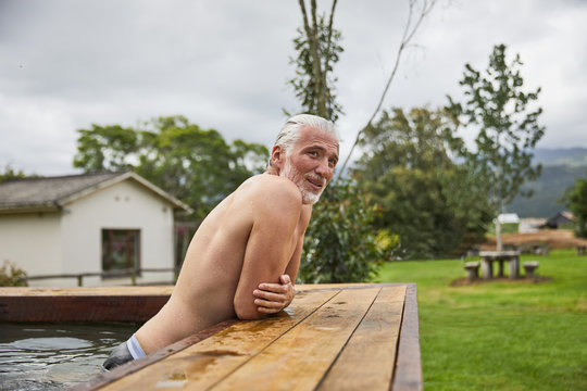 Mature Man Relaxing In Hot Tub