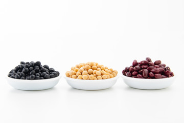 Various kinds of beans on white background