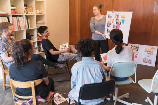 Creative designers meeting, discussing proofs