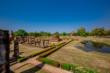 Fototapeta na wymiar Background, the landmark of the Buddhist tourist attraction in Sukhothai Historical Park, tourists all over the world come to see the beauty always in Thailand.