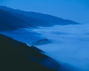 Fototapeta na wymiar Morning coastal fog over Pacific along Highway 1, California