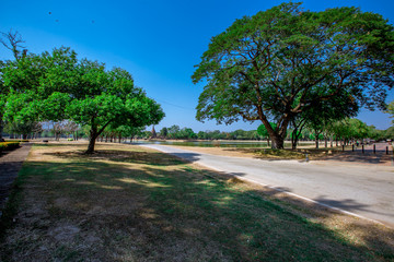 Background, the landmark of the Buddhist tourist attraction in Sukhothai Historical Park, tourists all over the world come to see the beauty always in Thailand.